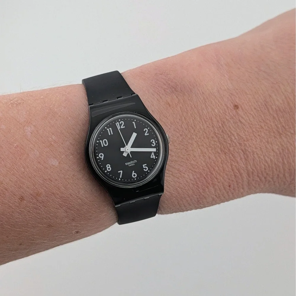Swatch Swiss Black Quartz Watch White Arabic Numerals 25mm Classic Minimalist